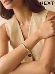 Gold Tone Twist Bangle (E22964) | $26