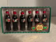 Evolution Of The Coke Coca-Cola Santa 6pc. Mini Bottle Ornament Set Series 1