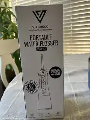 Electric Water Flosser Cordless Oral Portable New Never Used …ligh Purple