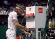 Bjorn Borg of Sweden pours himself a drink from a Coca Cola 1980 Tennis PHOTO