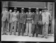 Japanese tennis player Jiro Sato with a group of men at Central St- Old Photo