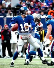 ELI MANNING NEW YORK GIANTS QUARTERBACK NFL PLAYER - 8X10 SPORTS PHOTO (DD-132)