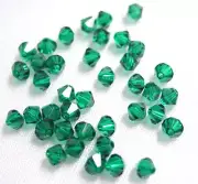 24 SWAROVSKI CRYSTAL 5328 EMERALD BICONE BEADS 4MM