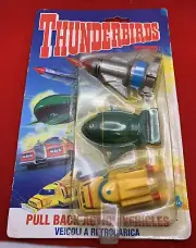 GROUP OF FACTORY SEALED BI-LINGUAL THUNDERBIRD TOYS SPACESHIPS FIGURES.
