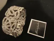 NEW KENNETH JAY LANE WOMEN WATCH RHINESTONE FLOWER HANGED CLAMPER-need Battery