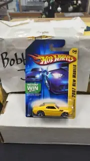 NIB 2006 1969 FORD MUSTANG YELLOW 2007 NEW MODELS HOT WHEELS HW 1/64 #4/36