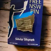 The Sunday Telegraph Sydney 2000 Olympic Torch Relay Pin AMP Sponsored