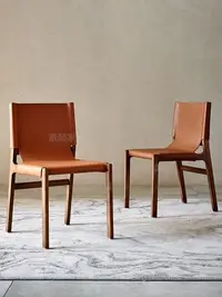 在飛比找Yahoo!奇摩拍賣優惠-馬鞍皮餐椅設計師餐廳餐椅現代簡約北歐白蠟木實木皮椅子家用餐椅