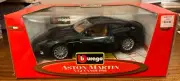 Bburago Aston Martin V12 Vanquish Metallic Green Cod..34063 Flawed Model 1/18