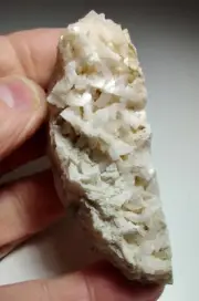 Dolomite crystals on Limestone. Franklin County, Indiana. 80 grams.
