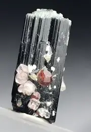 An Aesthetic And High Quality Thumbnail Of Spessartine With Apatite On Elbaite