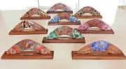 Hand painted & burnt decorated Boomerang with stand. Australian Aboriginal Art