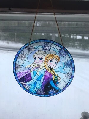 Disney Frozen Anna and Elsa suncatcher window decoration. really pretty.