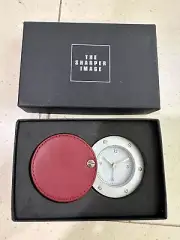 SHARPER IMAGE.. RED…Travel Folding Leather 4” Digital Alarm Clock