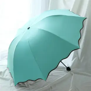 晴雨傘 遇水開花黑膠傘晴雨傘荷葉邊遮陽傘拱形三折折疊傘女