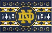 FANMATS 25847 Notre Dame Fighting Irish Holiday Sweater Starter Mat Accent Rug - 19in. x 30in. | Sports Fan Home Decor Rug and Tailgating Mat