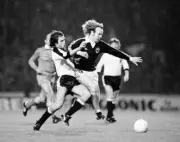 Arthur Graham of Scotland tackled by Herbert Weber of Austria duri- Old Photo