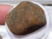 9.58 grams Gao Guenie Meteorite as found Olivine-bronzite chondrite (H5) w/ COA