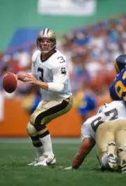 Bobby Hebert New Orleans Saints drops back to pass v Los Ang- Football Photo 1