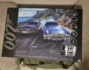Micro Scalextric James Bond Aston Martin DB5 vs V8 Battery Powered Slot Cars