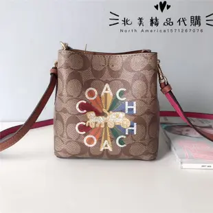 北美精品代購 COACH 6835 Mini 蔻馳新款 小號水桶包 字母印花小花朵單肩斜挎側背桶包 附購證