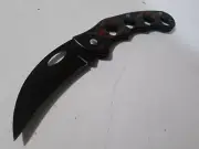 Curved claw shaped folding pocket knife non locking skeleton handle.