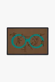 Monkey See Monkey Do Turquoise Doormat by Iris Apfel