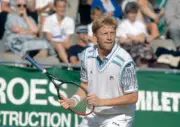 Boris Becker of Germany holds the face of his tennis racquet en r - Old Photo