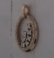 14k Rose Gold Round Diamond Scattered Oval Pendant 1/6 Cttw