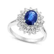 Oval Blue Sapphire and 0.50 CT. T.W. Natural Diamond Layered Starburst Frame Ring in Solid 14K White Gold