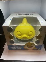 Core Innovations Baby Shark Alarm Clock and Bluetooth Speaker, Yellow