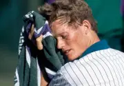 Wayne Ferreira of South Africa suffers in the heat during the Wimb- Old Photo