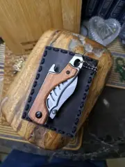 Pocket Knife And Handle Crafted Leather Sheath With Built-in Belt Loop.