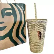 Starbucks gold studded cup with straw