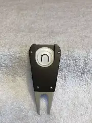 Metal divot repair tool with nexbelt ball marker