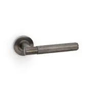 Alexander and Wilks Knurled Spitfire Door Lever on Round Rose Dark Bronze PVD