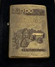 1997 ZIPPO CASE VISITORS CENTER BARRET SMYTHE BRASS LIGHTER UNFIRED IN BOX X24
