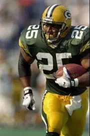 Running back Dorsey Levens Green Bay Packers carries the football - Old Photo