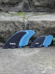 4.9" / 3.1" RM quad set of four fins, black on blue Pro Glass. FCSII compatible.