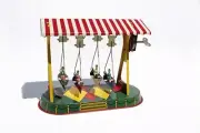 Large Swing boats. Tin Toy / retro / clockwork fairground toy
