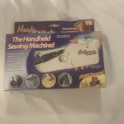 hand held sewing machine New In Box