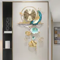 在飛比找ETMall東森購物網優惠-新中式創意孔雀客廳鐘表家用時尚個性時鐘現代裝飾大氣掛墻掛鐘