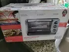 BLACK+DECKER TO1750SB 4-Slice Toaster Oven with Natural Convection - Silver