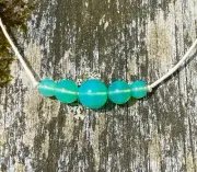 Emerald Green Uranium Glass 5-Bead Cord Necklace - Glows Under Blacklight