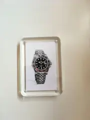 Rolex GMT Master Jubilee pepsi 126710BLRO paperweight.
