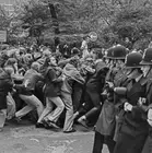 Police restrain a crowd of protestors demonstrating against a Natio - Old Photo