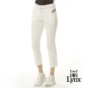 【Lynx Golf】首爾高桿風格！女款彈性舒適黑白彈性織帶剪接設計造型口袋開杈款窄管八分褲(二色)