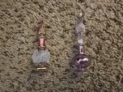 2 small refillable glass perfume bottles with a dropper