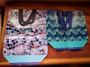 2 LAMINATED TOTE BAGS WITH GEOMETRICAL PATTERNS