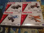 4 Sets of Erector by Meccano assorted Vehicles Car Plane Biplane Bulldozer